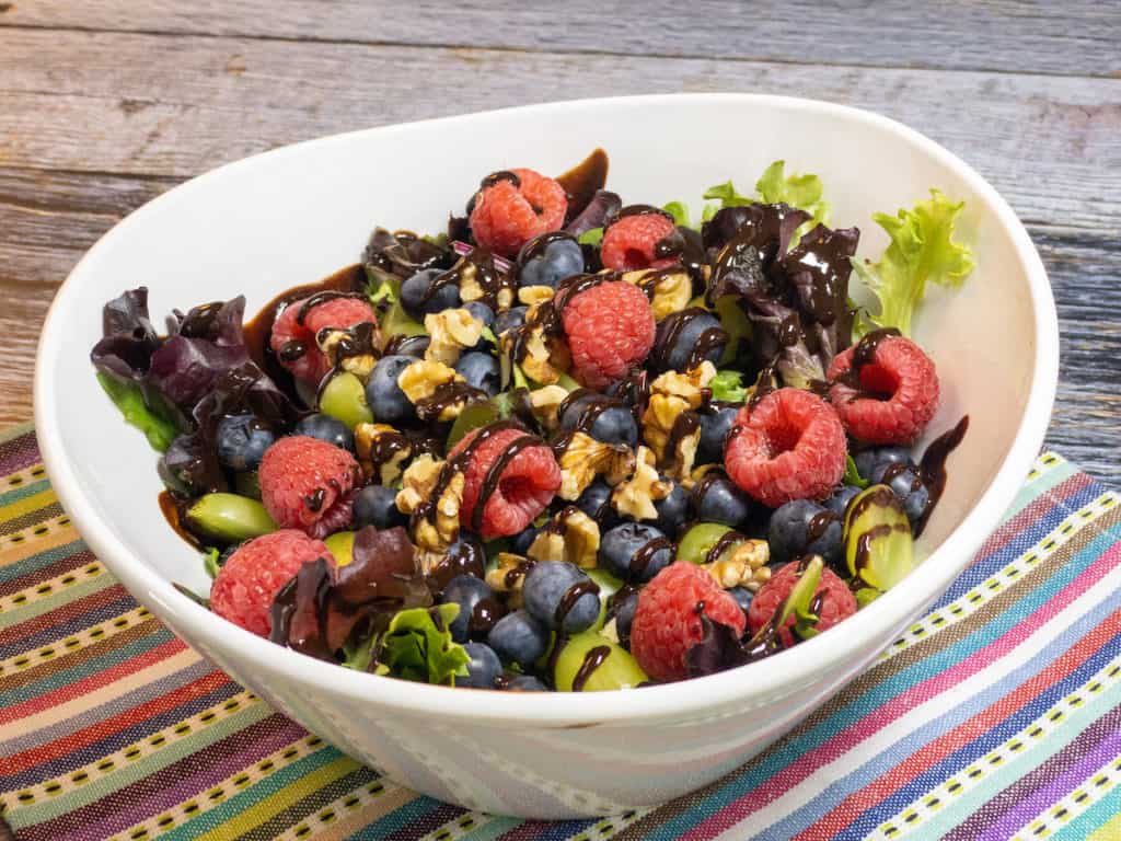 chocolate orange berry salad in bowl